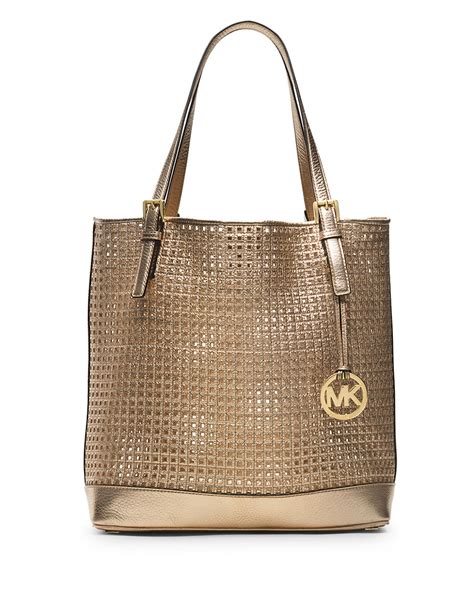 michael kors handbags gold|Michael Kors gold tote handbags.